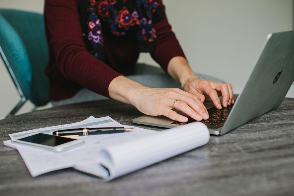 Close up of hands typing during Vancouver Personal Brand Session